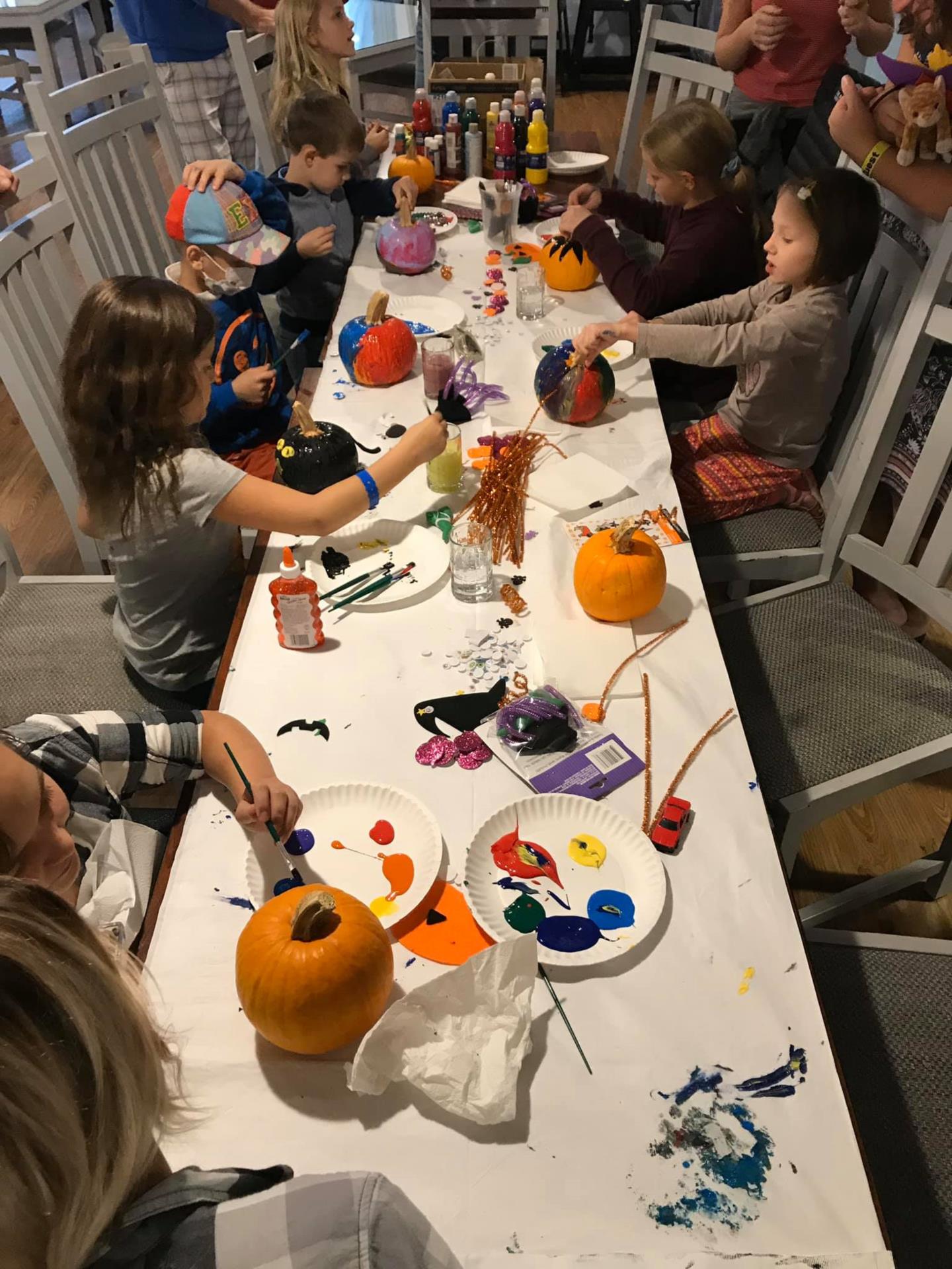Children Painting Pumpkins