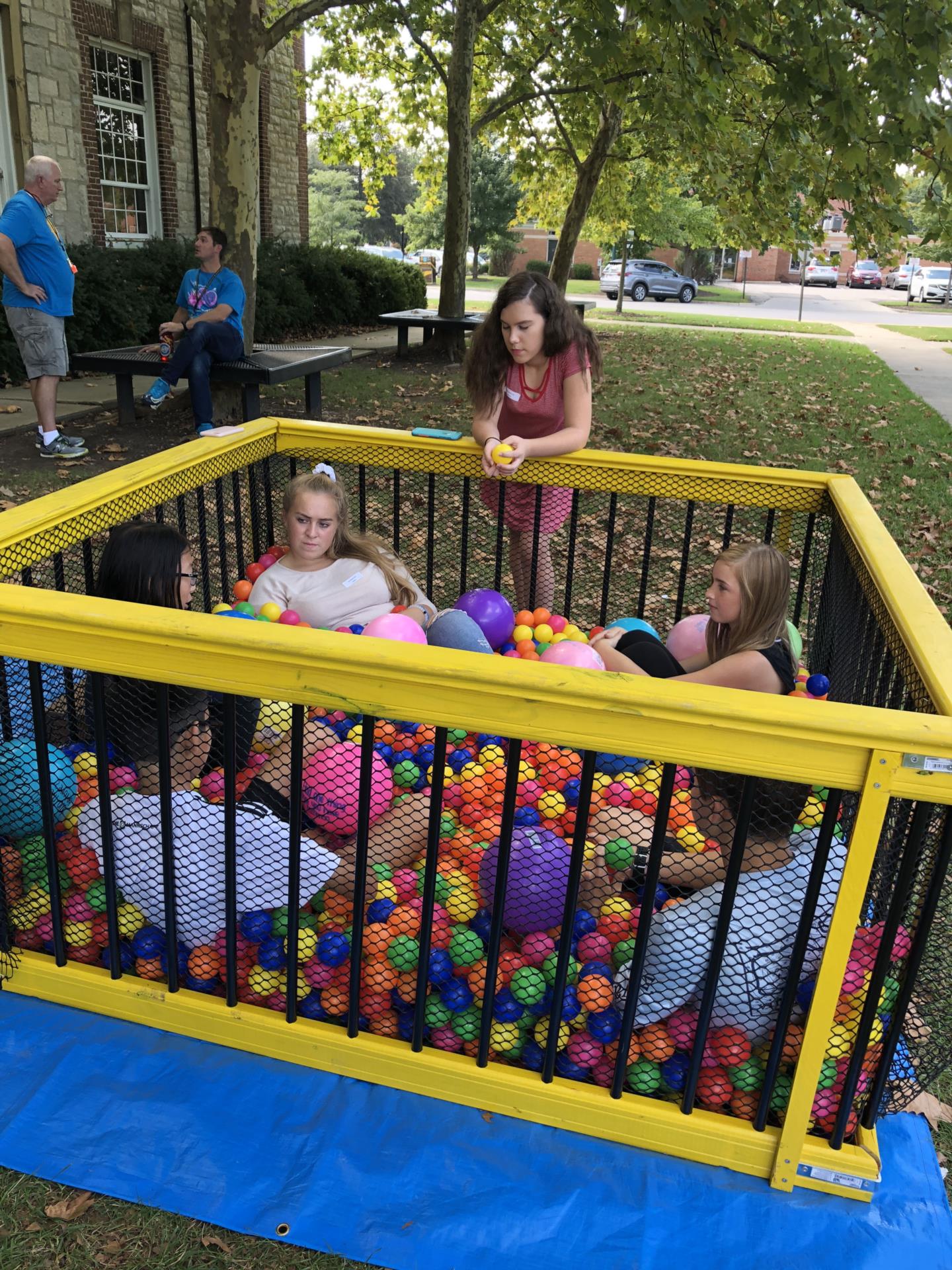 Students from Jones and the high school engaging in conversations in a ball pit