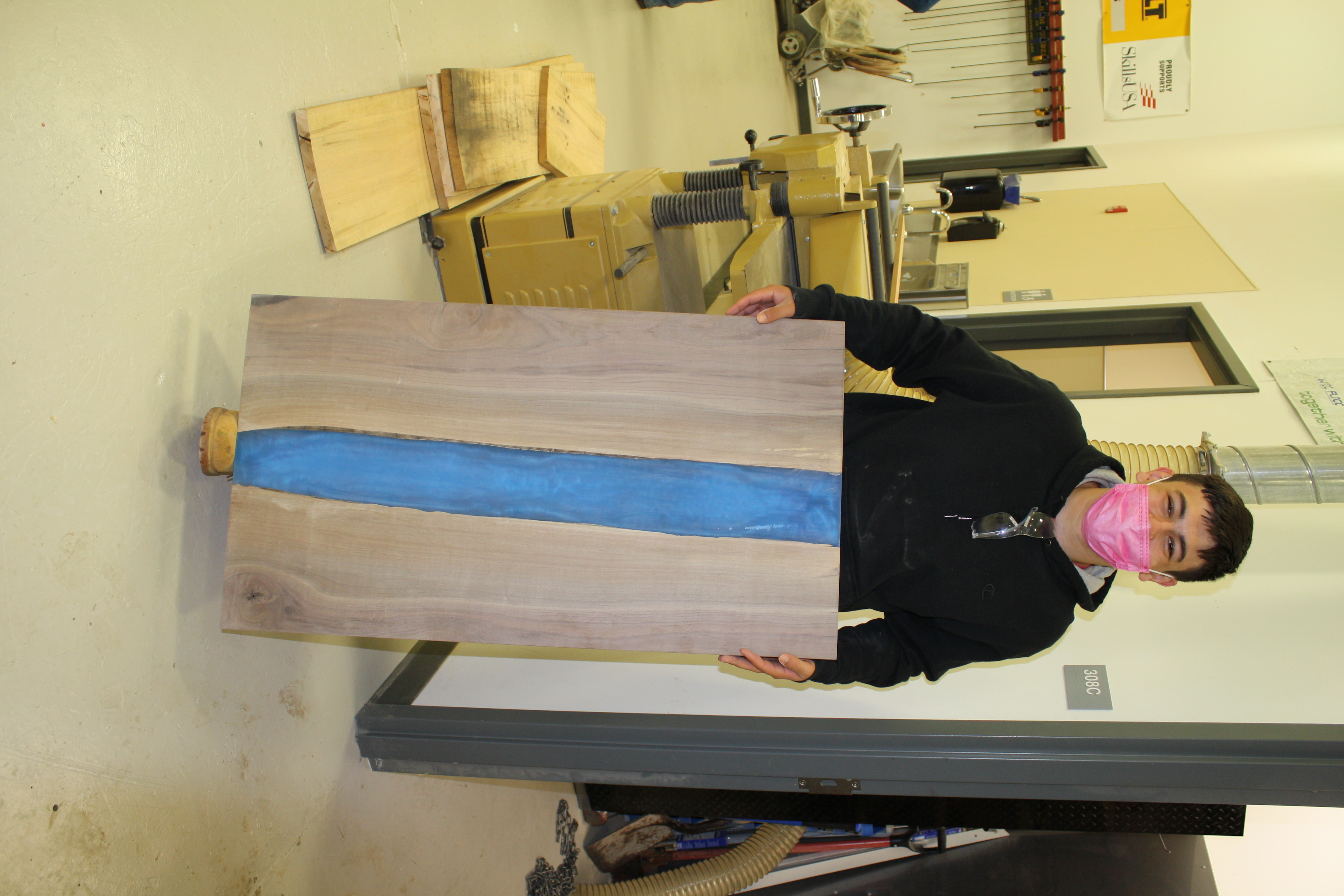 Senior Brian Benedetto (Churchville-Chili) used scrap lumber to make a geometric epoxy table. 